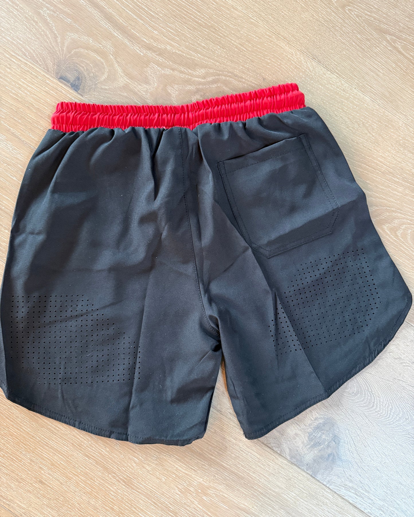 Black and Red Laser-Drilled Shorts